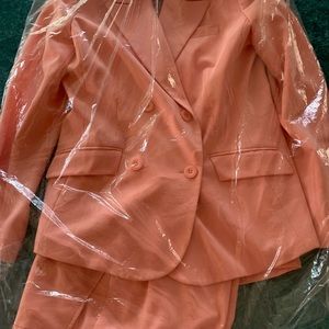 Lovely 3 piece light coral suit ideal for spring & summer. jacket,slacks & skirt